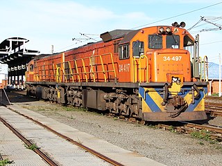 No. 34-497 in Spoornet orange livery at Cambridge loco depot, East London, Eastern Cape, 24 April 2013