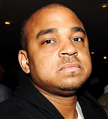 Artist Revenue Advocates sued West for usage of elements from "MSD PT2" within "Moon" on behalf of multiple songwriters, including credited co-producer and co-writer DJ Khalil (pictured). DJKhalil-VoiceActor.png