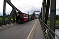 Heritage train on the Wiesenrain bridge over the Alpine Rhine