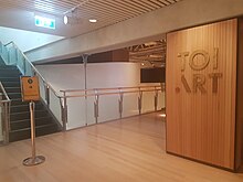 Sign, corridors and stairs at the entrance of the art gallery