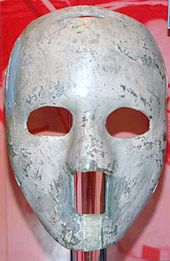 White fibreglass mask with holes for the eyes nose and mouth