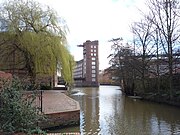 Looking upstream from Foss Bridge to Rowntree Wharf, with Wormald's Cut to the right. 53°57′29″N 1°04′38″W﻿ / ﻿53.957975°N 1.07725°W﻿ / 53.957975; -1.07725