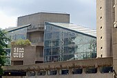 The Barbican Theatre where Bailey made his professional acting debut at the age of seven for the Royal Shakespeare Company Barbican Centre (facade).jpg