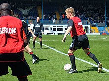 Monk warming up for Swansea before a League Two match at Bury during the 2004-05 season Promotion03.jpg