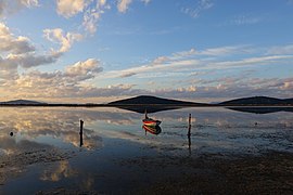 A boat rests unused near the Acheloos river delta