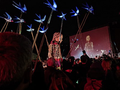 Little Amal among puppet birds in Castlefield Bowl, Manchester.[40]