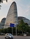 Wangjing SOHO in Beijing is a complex designed by Zaha Hadid that includes the world's 4th, 7th, and 8th tallest female-designed towers.