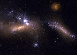 <span class="mw-page-title-main">NGC 1741</span> Distant pair of interacting galaxies in the constellation Eridanus