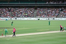 Shane Warne bowling against Sydney Sixers in 2011 at the SCG Shane Warne MelbourneStars.jpg