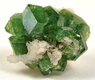 <span class="mw-page-title-main">Demantoid</span> Green gemstone variety of the mineral andradite