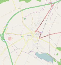 Mapa konturowa Olsztynka, blisko centrum u góry znajduje się punkt z opisem „Muzeum Budownictwa Ludowego – Park Etnograficzny w Olsztynku”