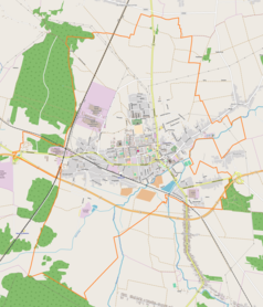 Mapa konturowa Opoczna, blisko centrum na prawo znajduje się punkt z opisem „Zamek Kazimierzowski w Opocznie”