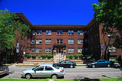 Stevens Court, the oldest contributing building in the Stevens Square Historic District, built in 1913.