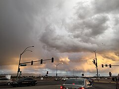 2015-11-04 16 28 48 Thunderstorms near sunset at a traffic light along Decatur Boulevard and Clark County Route 215 (Las Vegas Beltway) in Enterprise, Nevada.jpg