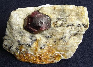 <span class="mw-page-title-main">Porphyroblast</span> Large mineral crystal in a metamorphic rock