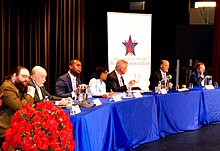 From left to right: Steve Seuferer, Andrew Wildman, Marcellus Crews, Angela Alsobrooks, David Trone, Robert Houton, and Brian Frydenborg