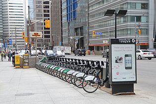 Bike sharing on a sidewalk in Toronto.