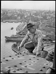 Stan Giddings, maintenance worker painting Sydney Harbour Bridge, 1945, by Alec Iverson