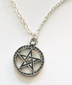 A pentacle necklace.