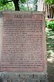 A plaque displayed at the entrance to the precincts of the tomb