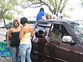 New Orleans in self supporting tops and tight jeans at the 2009 Uptown Super Sunday parade.