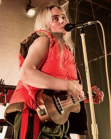 Eilish performing in 2017