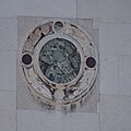 Marble disc on the facade