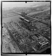 Aerial view of plant and Commodore Schuyler F. Heim Bridge, ca. 1950s