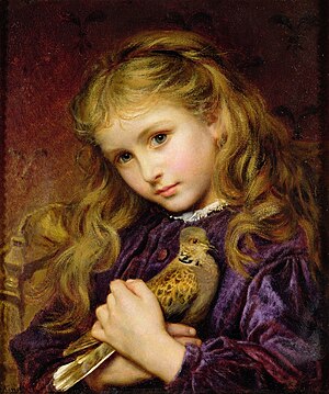 Portrait of a girl with long, loosely curled reddish-blond hair. She's wearing a long-sleeved dress of purple velvet with a thin line of white lace at her collar; the sleeves are gathered at the wrist. She holds a dappled brown turtle dove over her heart and looks directly at the viewer. The corner of a tasseled pillow can be seen in the background.