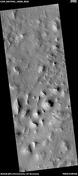 Wide view of layered buttes and small mesas, as seen by HiRISE under HiWish program. Some dark slope streaks are visible. Location is Aeolis quadrangle. Parts of this image are enlarged in next three pictures.