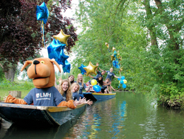 Members of LMH JCR in punts on an open day