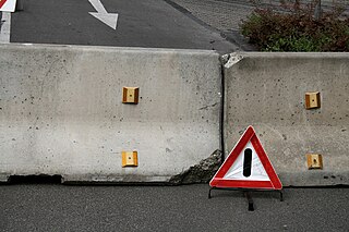 <span class="mw-page-title-main">Roadblock</span> Installation set up to block traffic on a road