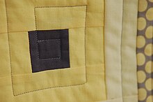 Seams join fabric pieces in this quilt. Quilting seam.jpg