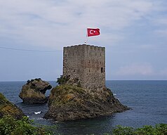 Stone tower on an island