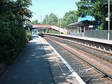 Eastbound service with 156498 at New Pudsey in June 2006 New Pudsey Stn.jpg