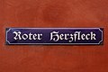 Straßenschild Roter Herzfleck