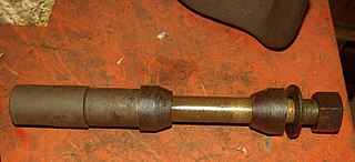 <span class="mw-page-title-main">Mandrel</span> Gently tapered cylinder against which material can be forged or shaped