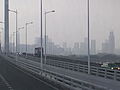 China Resources Headquarters (tallest building under construction on the far right) and other skyscrapers in Houhai as viewed from Shenzhen Bay Bridge