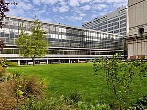 Sherfield Building, the central administrative building, from across the lawn. On the first floor are the junior and senior common rooms