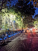 Bike sharing on a sidewalk in New York City.