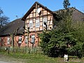 Bauernhaus mit Hahn