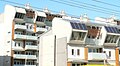 K2 Apartments. Windsor, Victoria. Completed 2006. Highly visible solar panels, prominent natural ventilators and use of natural materials.