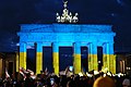 Brandenburger Tor opplyst med det ukrainske flagget. Foto: Leonhard Lenz