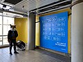 Photo area in Scarborough Centre Station with the background reading "Farewell Line 3" in various languages, as well as social media handles for Meta-owned websites and the hashtag #TakeTheTTC