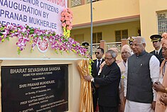 The President, Shri Pranab Mukherjee unveiling the plaque to inaugurate the old-age home and school building of Bharat Sevashram Sangha, in Gurgaon, Haryana on December 07, 2014. The Governor of Haryana, Prof. Kaptan Singh Solanki is also seen.