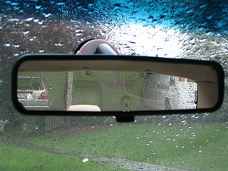 <span class="mw-page-title-main">Rear-view mirror</span> Mirror in vehicles that allows the driver to see rearwards