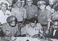 Image 33The Surrender of Pakistan took place on 16 December 1971 at the Ramna Race Course in Dhaka, marking the liberation of Bangladesh. (from History of Bangladesh)