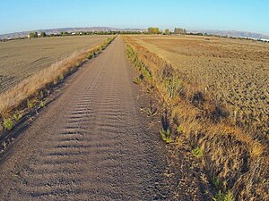 Coarse-grained soil particles on a gravel road in Fremont, California