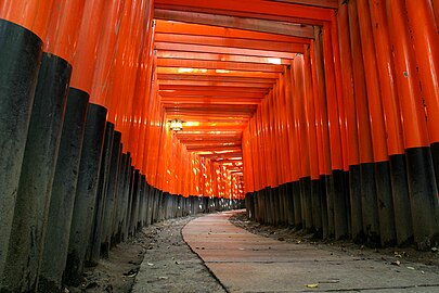 Thousands of torii gates line the paths of the celebrated Fushimi Inari Shrine in Kyoto, Japan