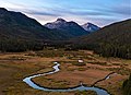 Ostler Peak and Spread Eagle Peak seen from Christmas Meadows Stillwater Fork of the Bear River in foreground